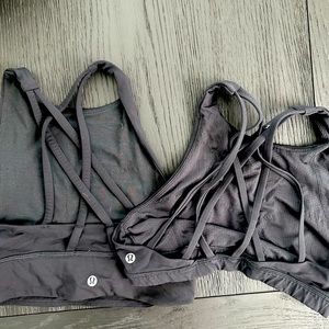 Two black Lululemon sports bras